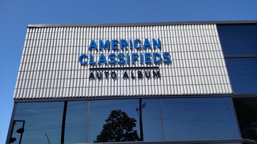 Non-illuminated flat cut out letters on clear stringers for American Classifieds